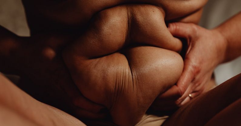 Fats - A Person Holding on to Belly Fat