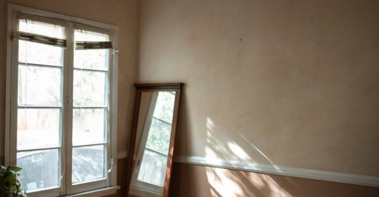 Cultural Awareness - Depressed Man sitting on a Wooden Floor