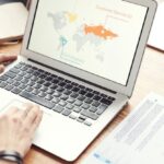 International Cooperation - Photo Of Person Using Laptop