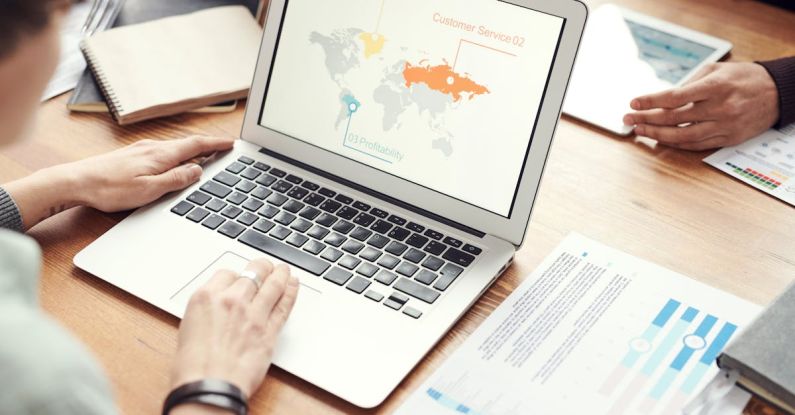 International Cooperation - Photo Of Person Using Laptop